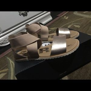 Warm gold metallic sorel sandals, used once
